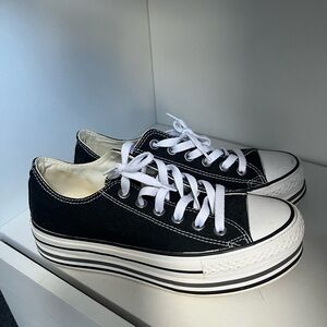 Classic black converse with platforms.